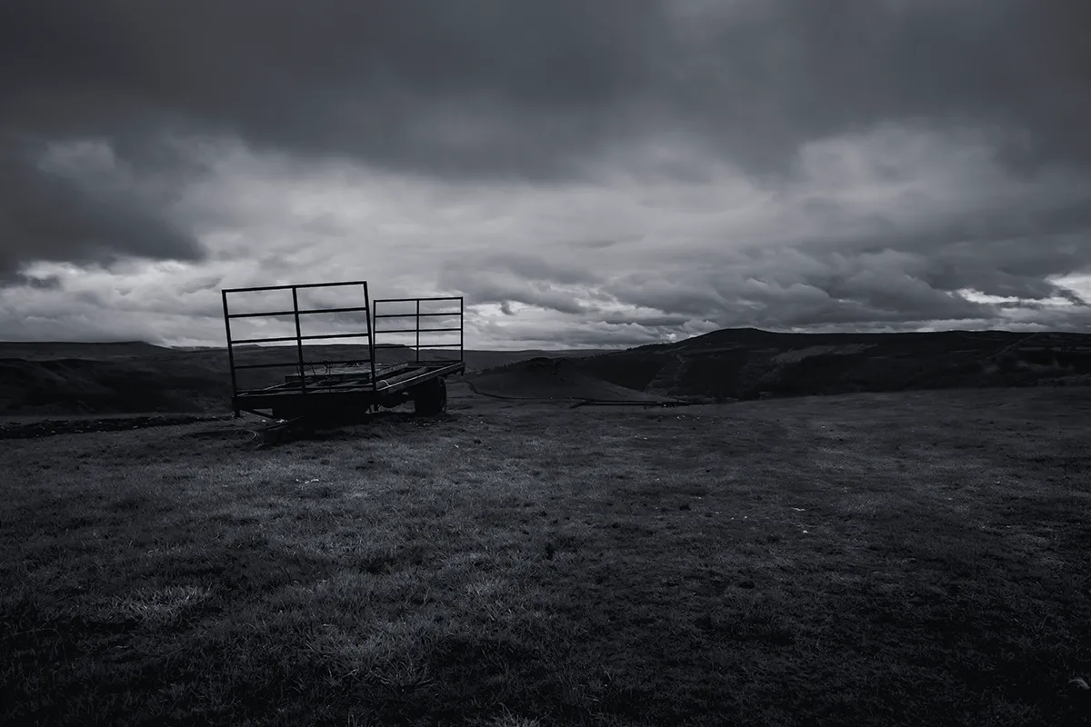 Seven-shot bracketed HDR blend of an old cart on Crook Hill under a stormy sky, Peak District