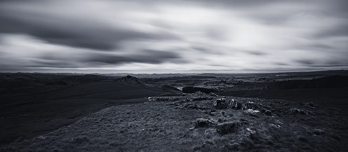 Long exposure of storm clouds moving over the hills from High End above Buxton