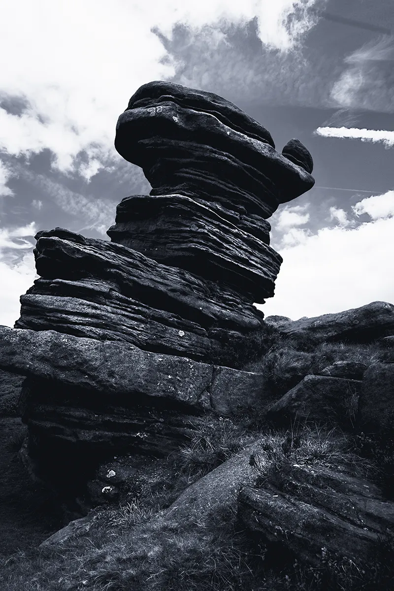 Portrait of the Salt Cellar rock formation against a dramatic sky