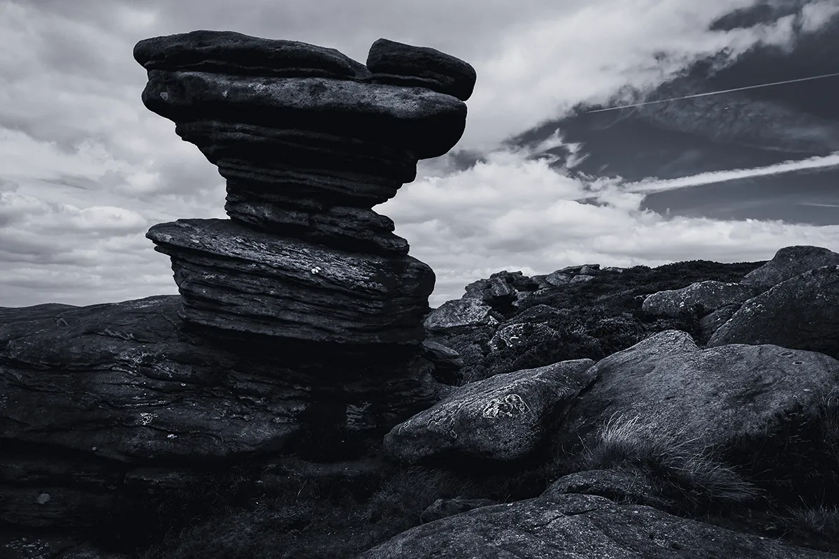 The Salt Cellar gritstone rock in black and white, on the Salt Cellar Derwent Edge walk
