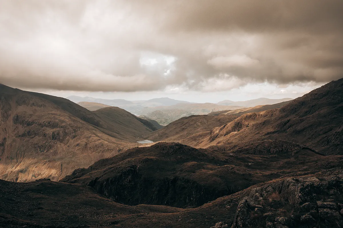 Evening light over the fells from near the summit of Scafell Pike