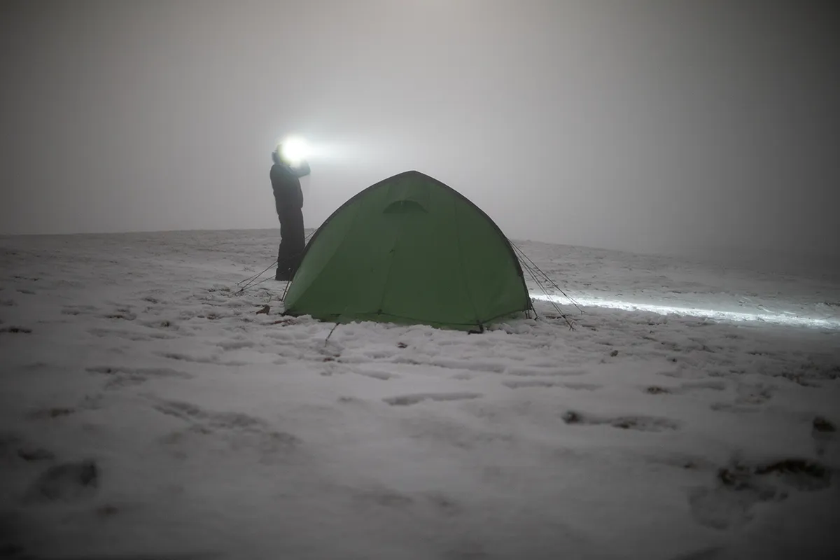 Vango Pulsar Pro 300 pitched on the snowy summit of Helvellyn at night